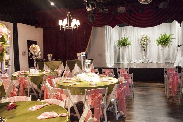 Elegant wedding, after the ceremony, the stage was converted to the head table for the bridal party.