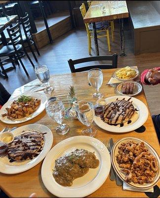 Chocolate chip pancakes X2, biscuits and mushroom gravy, migas, bacon tempeh, popcorn chicken and eggs