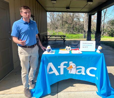 Jacob Poston of Hoston & Poston Insurance educates the community about Aflac policies.