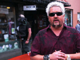 Guy Fieri standing at the entrance to Beatty Memorial Park