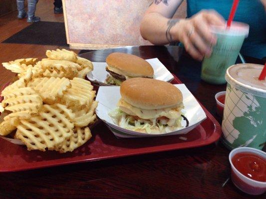 Chicken and beef burgers with waffle fries and shakes