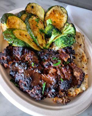 Meatloaf Plate: homemade meatloaf and mashed potatoes, secret sauce, oven roasted seasonal veggies