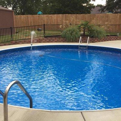 Unusual round inground pool.  Beautiful water!