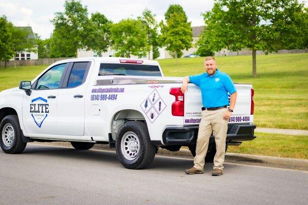 Brad, Owner with his pest control truck