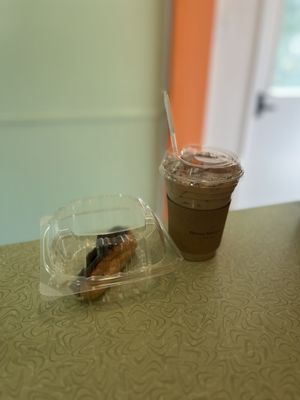 Chocolate eclair and iced latte