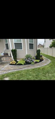 Beautiful landscape with fresh black mulch