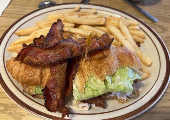 Croissant Club Sandwich and Fries. Open for breakfast and lunch.