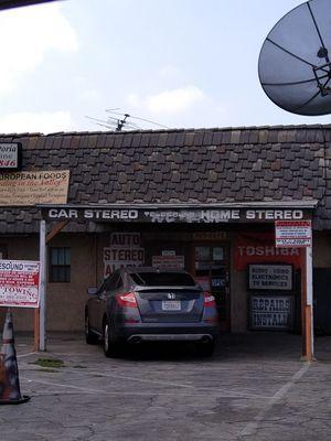 Plenty of parking in back of Vanowen entrance on White Oak.  Rear shop entrance in back pictured here.