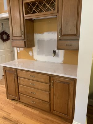 bar area ( complementary quartz -so no worries about wines/lemons/ stain)