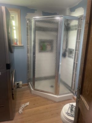 Neo angle shower, stackable washer/dryer install...