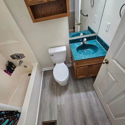 New bathroom flooring w/molding