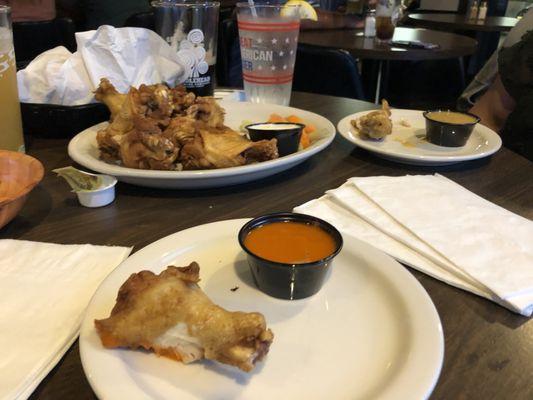 Naked wings with side dipping sauces, a good way to split an order and have the sauces we want.