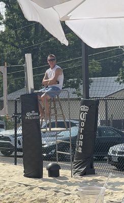 The owners claim to "standing" the whole time while refereeing the volleyball game.