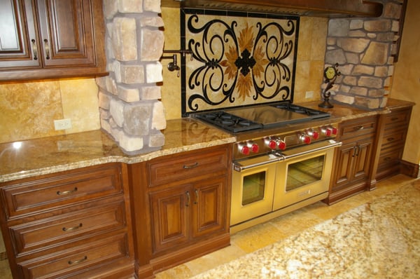 Tuscan style kitchen with custom granite countertops.