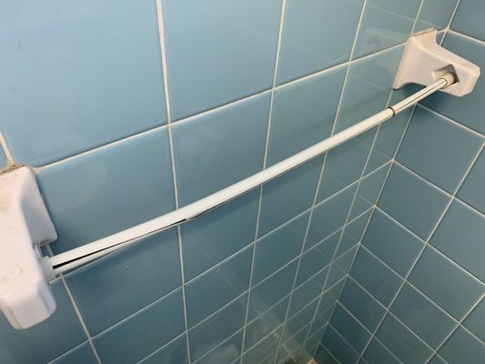 Curtain rod as towel rack