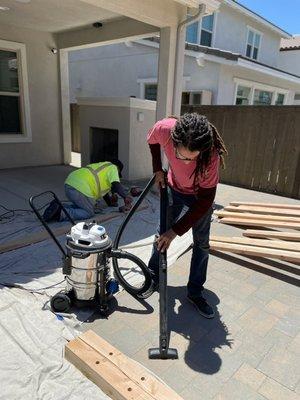 Making sure we clean as we proceed with the privacy wall install