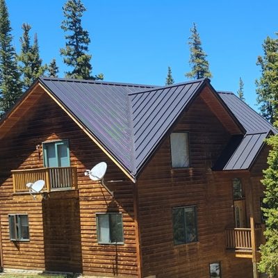 Matte Black 1.5" Mechanical Double Lock Standing Seam Metal Roof in Breckenridge, Colorado.