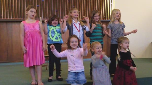 Our kids singing and getting down during worship