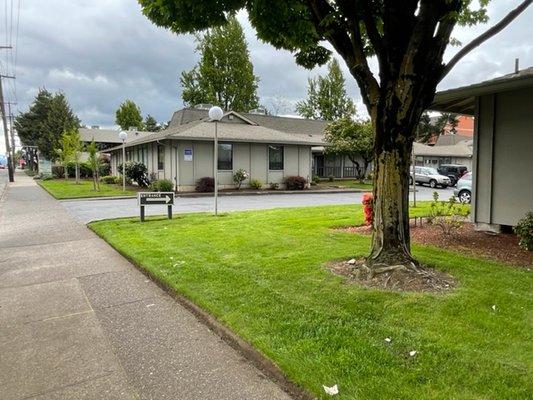 Driveway to business complex is directly off Stark St. Our offices are in the NE corner of the complex, adjacent to Stark.