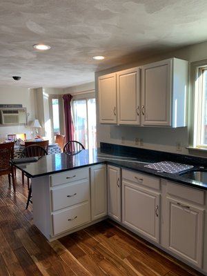 Changed from light stain to white cabinets!