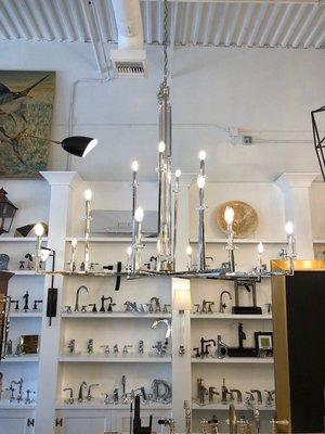 A whole wall of faucet options, and lighting galore!