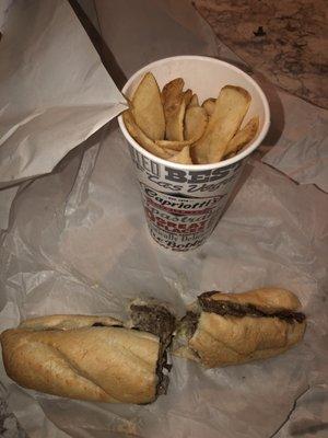 Cheesesteak with extra American cheese and large fry