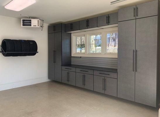 Gorgeous Garage cabinets in Pewter with Tire Rack and Slat wall