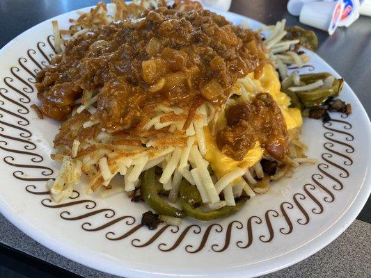 Hash browns smothered covered diced peppered topped