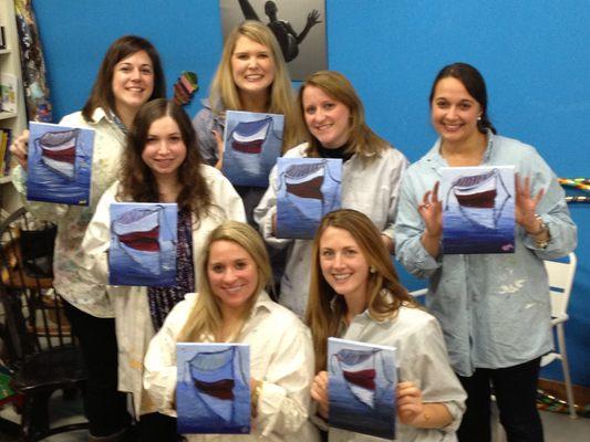 Lovely ladies showing off their awesome paintings from BYOB paint night- a great chance to get together with friends and family.