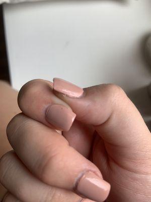 Overlap of polish near cuticle