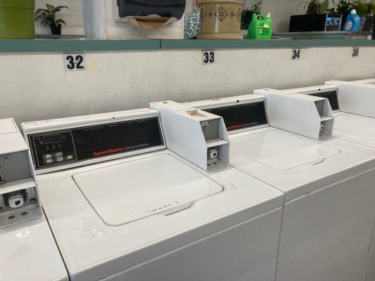 All the washers in the entire laundromat in use or filled