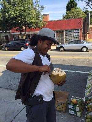 Drink coconut water from a coconut