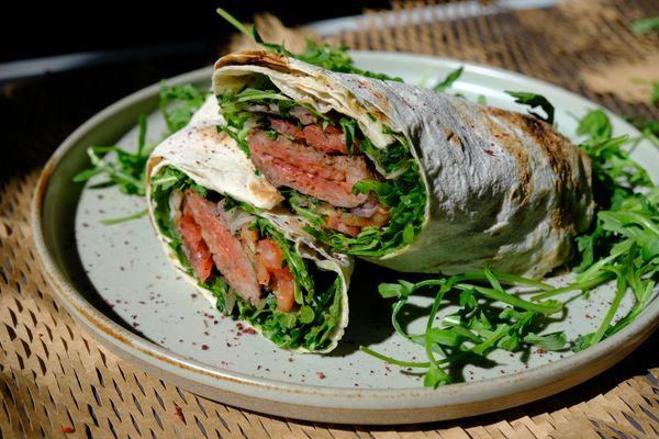 KEBAB WRAP banana chili sauce, tomato & onion salad, pickled onion, avocado, arugula, lavash