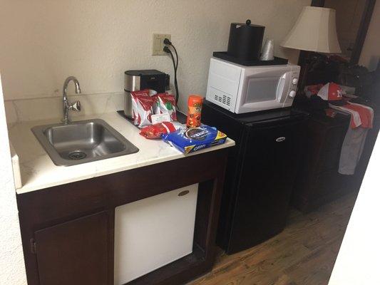 Two fridges, another sink, a microwave, and of course snacks we bought! Lol