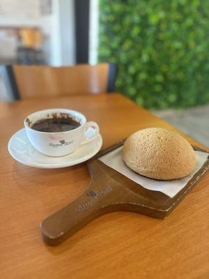 Turkish coffee and signature bun. I love the presentation board for the bun.