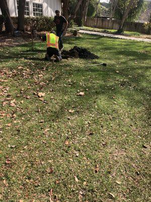 All in Sanitation crew locating the septic tank.