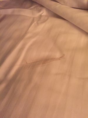 No idea what type of stain that is... But was there when I pulled the sheets back.