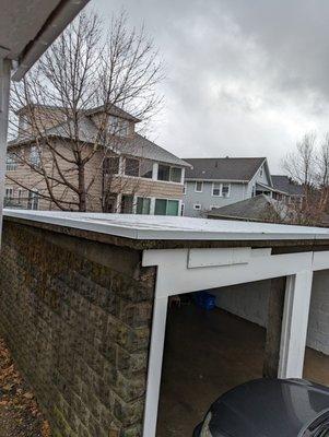 White rubber roof on two car garage done by Universal Roofing, MA