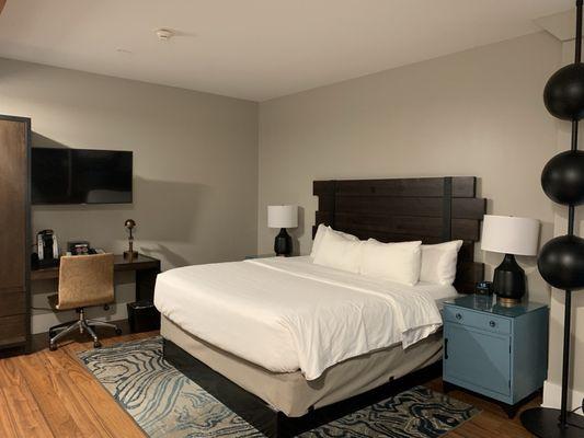 King size bed, tv, keurig, phone charging stations & iron & board provided