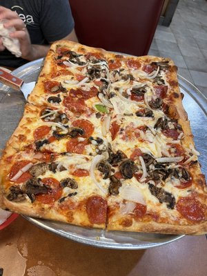 Grandma's pizza with added toppings (mushrooms, onions, & peperoni)