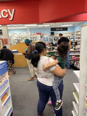 Long lines all the time at pharmacy  1 person at register all the time.