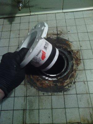 Repairing a broken cast iron toilet flange