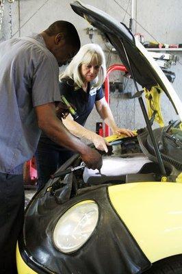 Coleen and Isaac working on the bug.