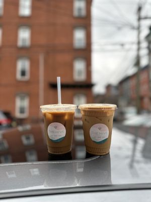 Iced coffee on the left, latte on the right.