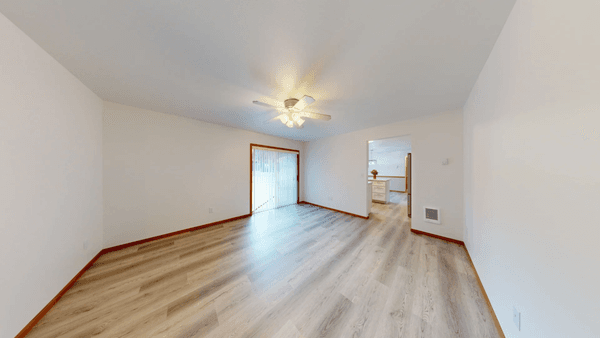 View of Family Room remodel by Merritt builders. New flooring, base, drywall/texture