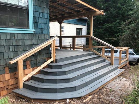 Trex decking stairs leading to new deck.