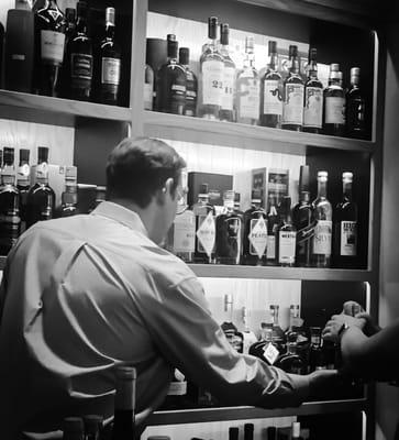 Rhett kindly helping Karen with her gin selection