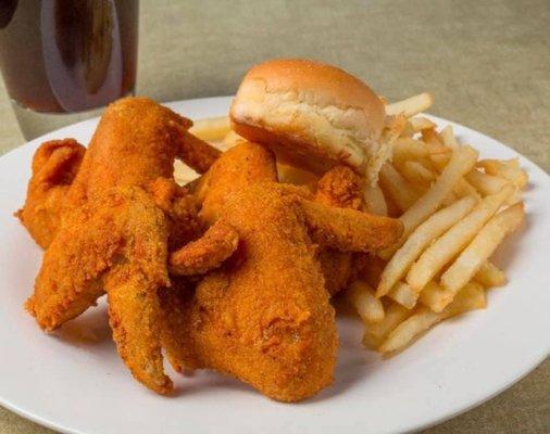 Delicious Wings with Fries and a soda