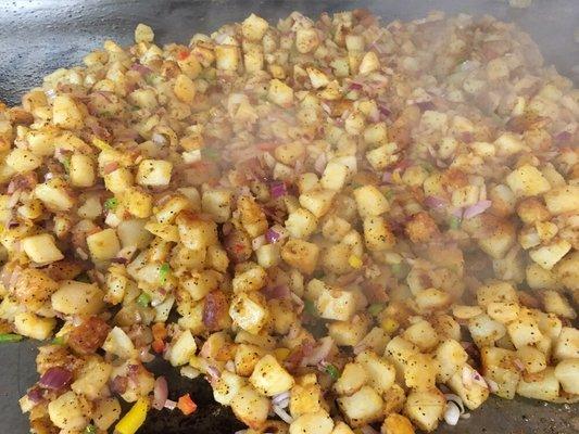 Home fried potatoes  with red ,green ,yellow , and red onions 2015