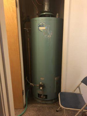 OLD hot water heater using up an entire closet